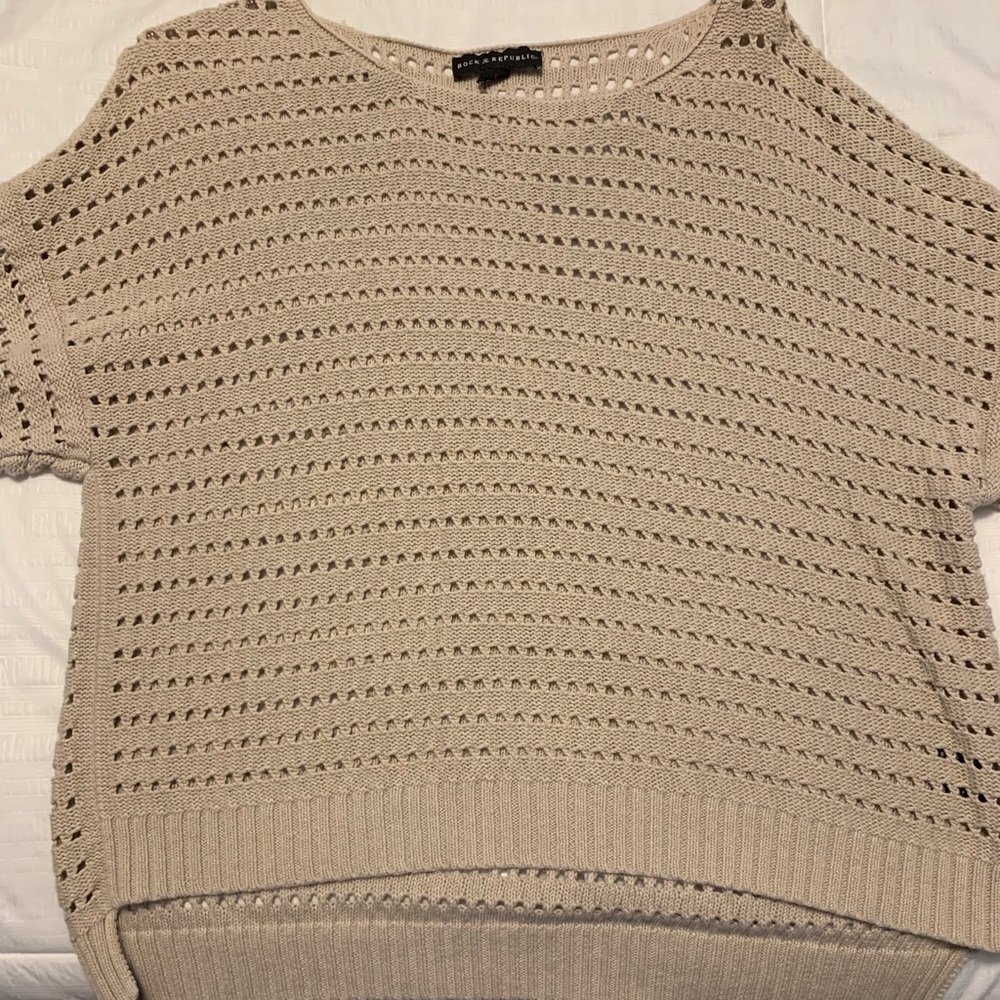 Tan sweater. Holes. Needs undershirt